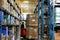 A forklift moving goods in a warehouse.