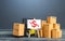 Forklift near boxes and easel with red dollar arrow down. Decline trade and production rates, decreased sales. Bad marketing,