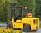 Forklift next to some flowers