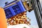 forklift pouring industrial apples in big plasti crate into truck