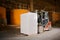 Forklift with stack of finished blocks in plant workshop