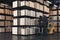 Forklift transporting cargo at warehouse. Forklift loader at storehouse. Pallet stacker truck equipment. 3d rendering.