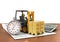 Forklift truck with boxes and stopwatch.