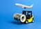 Forklift truck carries a bundle of dollars and airplane. Export of capital, offshore economic zones. Attracting direct investment