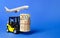 Forklift truck carries a bundle of Euro and airplane. Attracting direct investment in business and production, improving economics