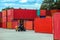 Forklift truck lifting cargo container