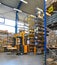 Forklift truck in a warehouse of a commercial enterprise, high r