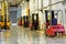 Forklift Trucks in stock. Corridor large warehouse.