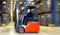 Forklift in warehouse