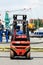 Forklift with workers in the habour, Germany