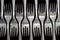 Forks on a black background