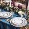 Formal holiday tablescape with blue decor, dinner table setting, table scape with elegant tableware and dinnerware for wedding