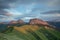 The formation and movements of clouds up to the steep slopes of the mountains of Central Caucasus peaks.