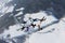 Formation skydiving in the winter season.