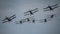 Formation of Tiger moth aircraft in flight