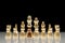 Formation of white chess pieces with a black pawn