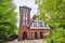 Former historic fire station with a brick facade and half-timbering