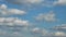 Forming puffy clouds dramatic sky fast motion picturesque day time-lapse