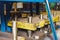Forms for a hydraulic press on a rack. industrial metalworking machines. Close-up of hydraulic press stamping molds in an