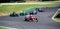 Formula cars group action during race on asphalt track circuit