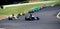 Formula cars group action during race on asphalt track circuit