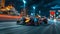 Formula One racing event at night. Formula One cars speeding down track. Blurred urban street background with
