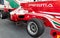 Formula regional racing car single seater with wet tires full length
