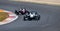 Formula single seater sport racing cars couple challenging action on asphalt track turn