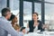 Formulating new ways to do business. Cropped shot of a group of colleagues having a meeting in an office.