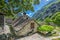 Forogio village with typical stone houses and Swiss Alps, Bavona valley, Ticino, Switzerland