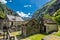 Forogio village with typical stone houses and Swiss Alps, Bavona valley, Ticino, Switzerland