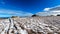 Forstalpe - Woman with hiking backpack walking on snow covered alpine meadow on trail from Ladinger Spitz