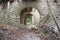 Fort Bastione, a nineteenth-century military fortress, abandoned to the neglect of nature. distressing stone construction inside