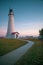 The Fort Gratiot lighthouse in Michigan with a freighter in the background