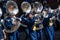 Fort Mill High School Band Playing Brass Instruments and Marching Through Town Centre.