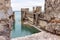 The fortified internal port of the Castello Scaligero fortress in the Sirmione town in Lombardy, northern Italy