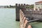 Fortified wall of Scaliger Castle in Sirmione, Lombardy, Italy