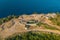 Fortress Mogren in Budva. Montenegro. View of the ruins of the Mogren fort from above. Aerial photography