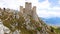 The fortress of Rocca Calascio among the rocks.