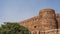 The fortress wall of the Red Fort is built of red sandstone bricks