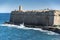 Fortress walls and gun post tower Valletta Malta