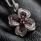 Fortune\\\'s Jewel A Sophisticated 4-Leaf Clover Pendant with a Modern Futuristic Design Adorned with Diamonds and Rubies