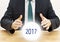 Fortune teller businessman predicting future new year 2017