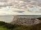 Fortuneswell village on Isle of Portland in Dorset with a long stripe of Chesil beach. Great Britain.