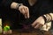 Fortuneteller`s hands. The fortune teller opens a bag of herbs, a magic potion. Psychic readings and the concept of clairvoyance