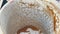 Fortunetelling with coffee remains. Empty white cup of latte. Tasty cappuccino pattern close up.