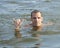 Forty-four year old Caucasian man enjoying a swim in Grand Lake in Oklahoma