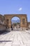 Forum of city destroyed by the eruption of the volcano Vesuvius, view of the Temple of Jupiter, Pompeii, Italy