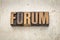 Forum word in wood type