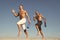 Forward to healthy lifestyle. Men with yoga mat captured in motion blue sky background. Sportsman with mat running. Run